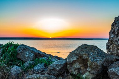 Akşamları güneşin ışınları.