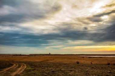 Sahilde gün batımı