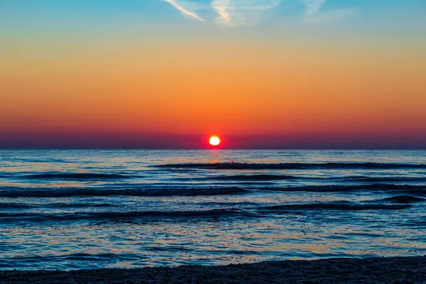 Gün batımında güzel bir gündoğumuyla