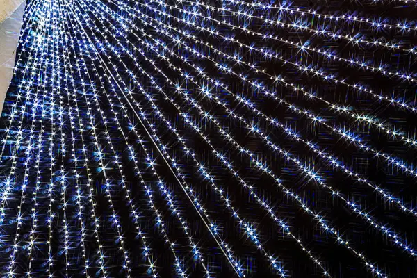 Parlak çizgiler ve noktalarla soyut arkaplan