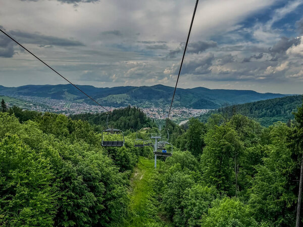view of the mountains and the car cable