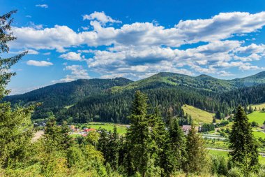 view of the carpathian mountains from top of the mountain.