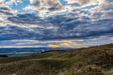 beautiful sunrise over the clouds in the sky