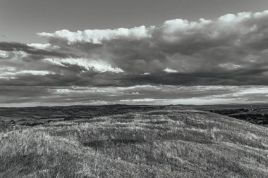 black and white photo of an old stone landscape in the mountains.
