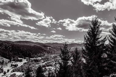 a beautiful shot of the mountains in the carpathian mountains in romania in autumn