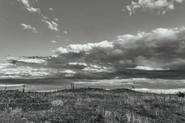 black and white landscape with clouds