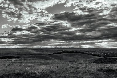 view from the top of the hills of the black and white landscape.