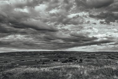 dramatic storm clouds over black hills
