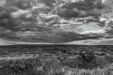 beautiful landscape with a field of clouds in the background