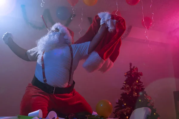 fat santa claus dancing crazy in a room 