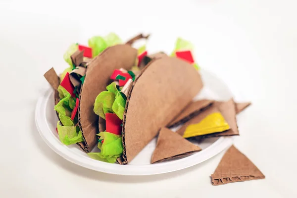 Fake tacos made of cardboard, fast food, junk food