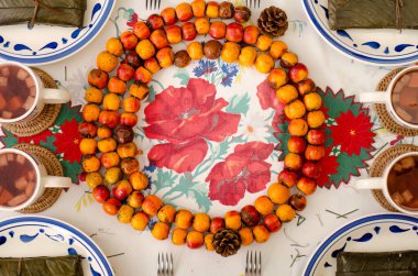 Top view of table with food and Christmas decorations. clipart