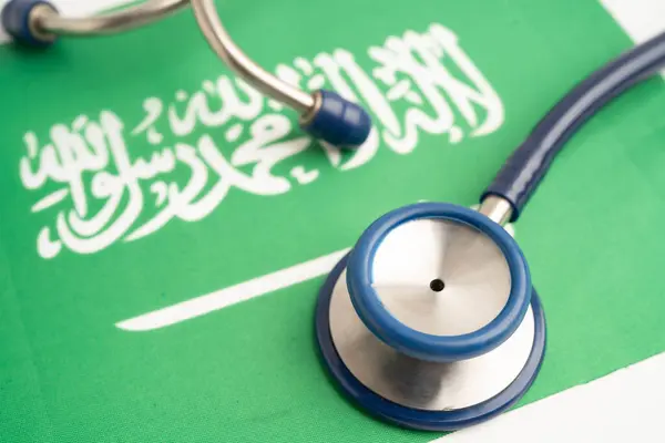 Steteskop, İş ve Finans ile Suudi Arabistan bayrağı.