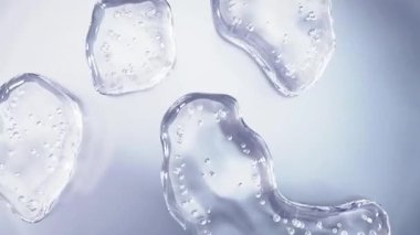 Şeffaf baloncuklardaki esans damlaları damlatan tüpten düşer ve deri tabakasını aşamalı olarak aşamalı olarak daha iyi bir cilt için deler. 3D makyaj reklamı, sivilceleri iyileştirme, esnekliği artırma