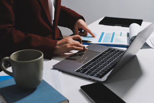 Tax deduction planning concept. Women use a calculator to calculate expenses and taxes to receive tax deductions for personal individual Income. tax return for individual persons.monthly expenses