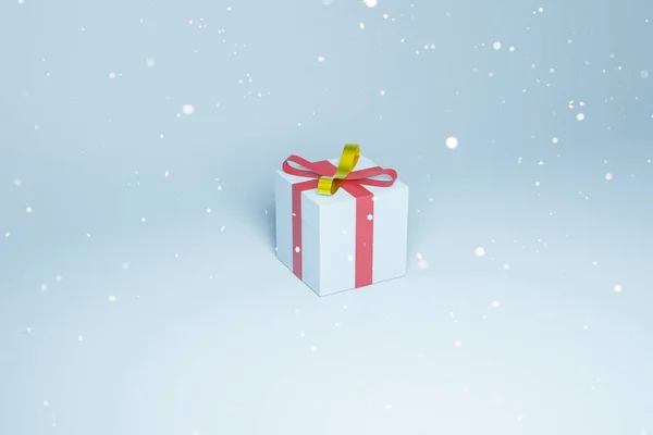 弓結びとリボン付きの青いギフトボックスの3Dレンダリング 冬休み テキストスペース付きプレゼントのクリスマス関連イラスト 青の背景 — ストック写真