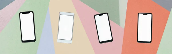 Telefones Celulares Com Telas Branco Contra Papel Abstrato Texturizado Fundo — Fotografia de Stock