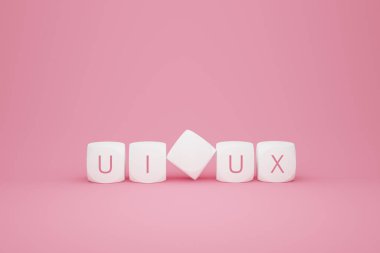 Pembe arka planda UI UX işareti olan beyaz plastik karolar, 3D işlemeli. Tasarım, kullanıcı arayüzü ve kullanılabilirlik işaretli harf küpleri, kavramları