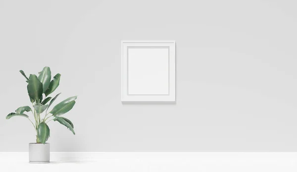 stock image Mockup of a generic room with grey wall, white floor, empty picture frame and a plant, 3d rendering. Template and background of a living room or a hall with copy space