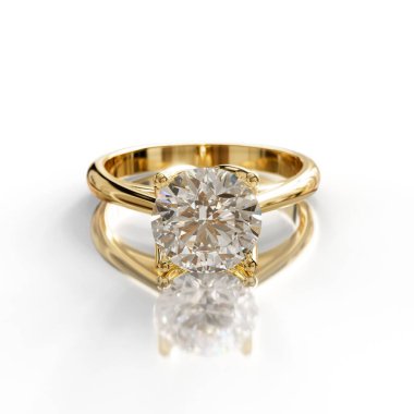 Klasik sarı altın solitaire yüzük, dört uçlu bir ortamda parlak bir elmas, sıcaklık ve karmaşıklık yayıyor. Ebedi zarafeti sevenler için ideal..