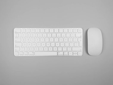 Açık gri arkaplanda beyaz klavye ve farenin üst görünümü. Modern ofis yatağı, kopyalama alanı.