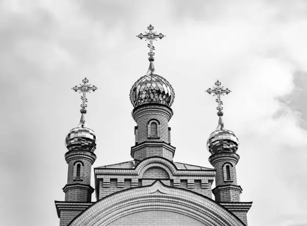 stock image Christian church cross in high steeple tower for prayer, photography consisting of beautiful church with cross on steeple tower to sincere prayer, cross steeple tower is church prayer over clear sky