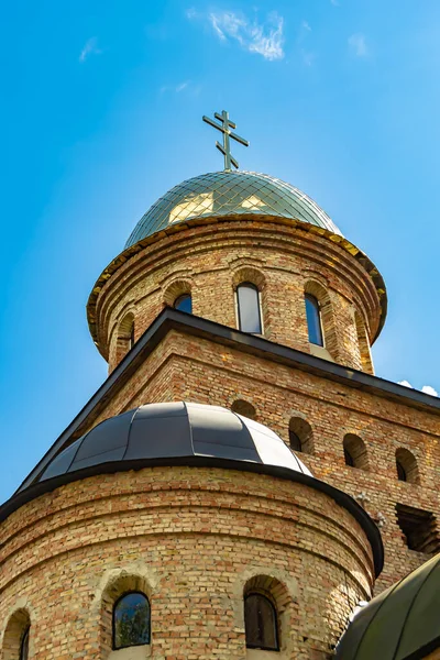 stock image Christian church cross in high steeple tower for prayer, photography consisting of beautiful church with cross on steeple tower to sincere prayer, cross steeple tower is church prayer over clear sky