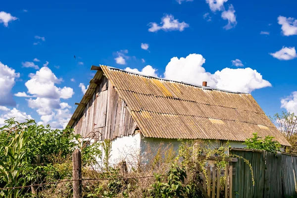Beautiful old abandoned building farm house in countryside on natural background, photography consisting of old abandoned building farm house at wild grass, old abandoned building farm house over sky