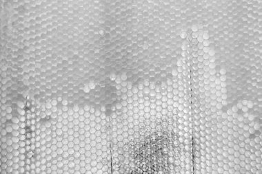 Altın nektarla dolu altıgen bal peteklerinden arı damlayan bal damlası, bal peteği yaz kompozisyonu doğal bal damlası, balmumu çerçeve arısına damlayan bal damlası, bal peteğine damlayan bal damlası