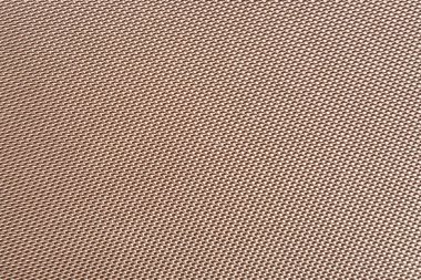 Yakın plan kahverengi sentetik kumaş dokulu, ızgara benzeri desenli. Endüstriyel veya moda tasarımı için uygun dayanıklı tekstil yüzeyi. 