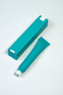 A sleek and modern eye cream tube mockup designed for product packaging presentations. Isolated on white for easy editing and customization. Perfect for stock images and commercial use.