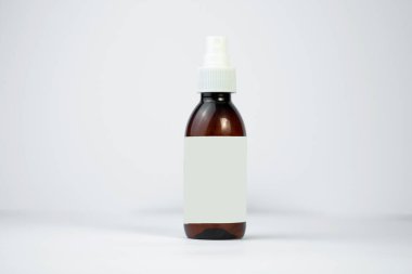 Hair growth spray bottle mockup isolated on a clean white background. Perfect for product displays and branding.