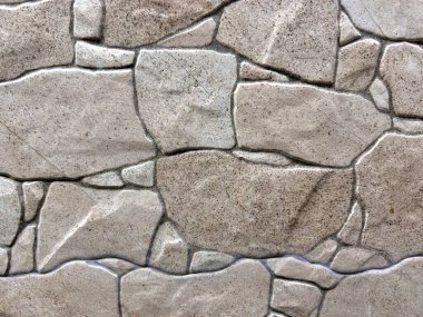 Çakıl taşı, genellikle kaldırım, cadde ve binaların yapımında kullanılan doğal yuvarlak taşlar anlamına gelir. Düzensiz şekilleri ve boyutlarıyla karakterize edilirler, bu da kırsal bir görünüm yaratır..