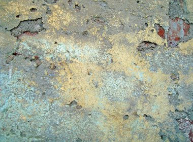 Eski duvarın arkasında bir taş deseni var.