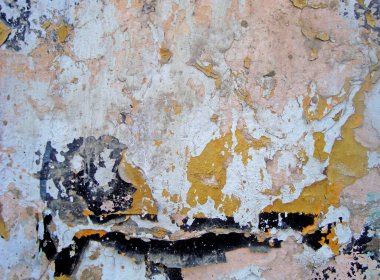 Eski duvarın arkasında bir taş deseni var.