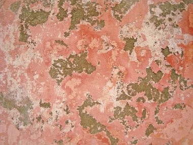 Eski duvarın arkasında bir taş deseni var.