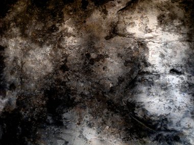 Eski duvarın arkasında bir taş deseni var.