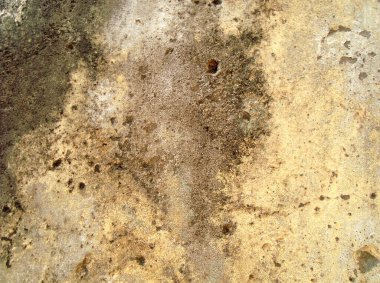 Eski duvarın arkasında bir taş deseni var.