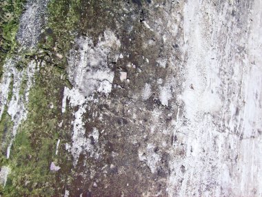 Eski duvarın arkasında bir taş deseni var.