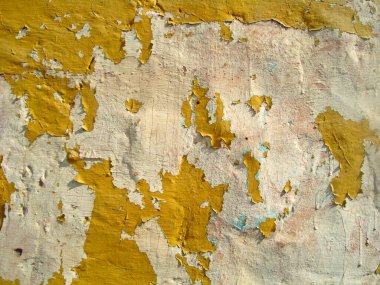 Eski duvarın arkasında bir taş deseni var.