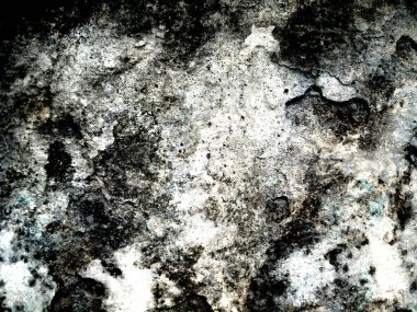 Eski duvarın arkasında bir taş deseni var.