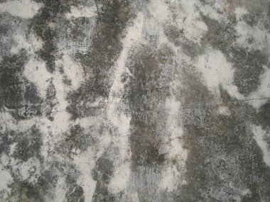 Eski duvarın arkasında bir taş deseni var.