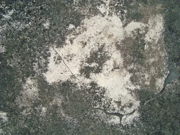 Eski duvarın arkasında bir taş deseni var.