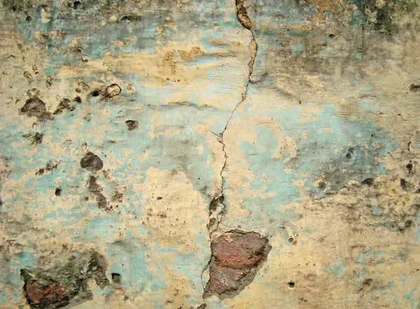 Eski duvarın arkasında bir taş deseni var.