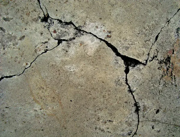 Eski duvarın arkasında bir taş deseni var.