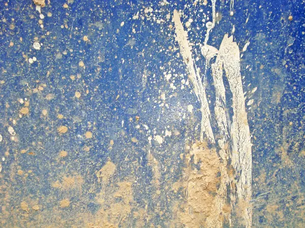 Eski duvarın arkasında bir taş deseni var.