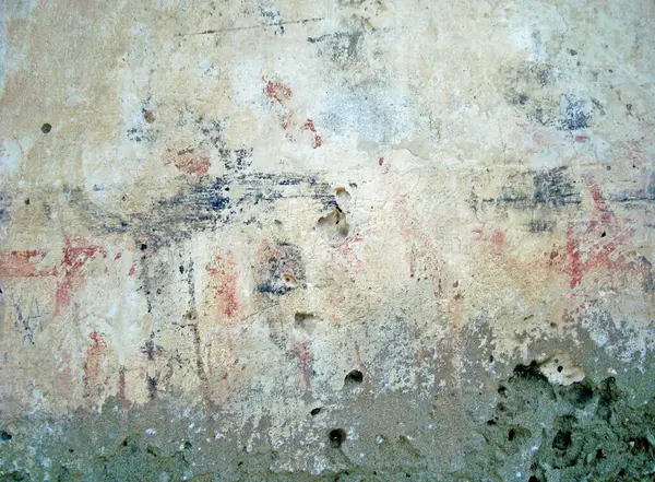 Eski duvarın arkasında bir taş deseni var.