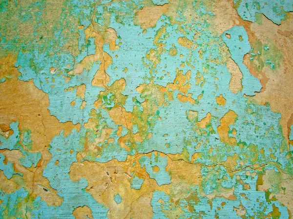 Eski duvarın arkasında bir taş deseni var.