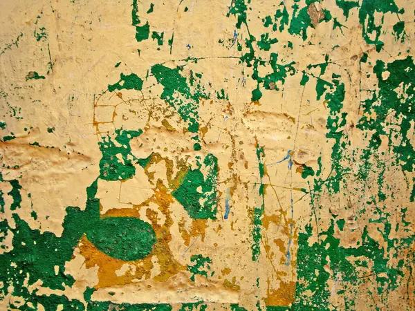 Eski duvarın arkasında bir taş deseni var.