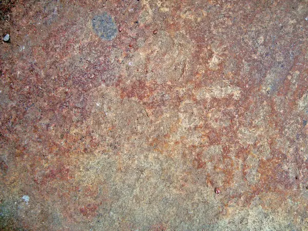 Eski duvarın arkasında bir taş deseni var.